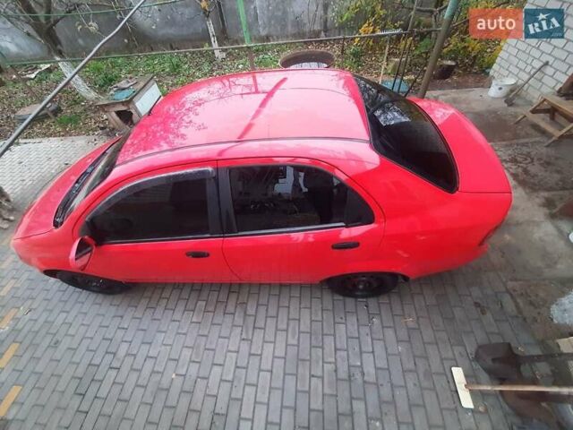 Красный Шевроле Авео, объемом двигателя 1.5 л и пробегом 196 тыс. км за 3300 $, фото 2 на Automoto.ua