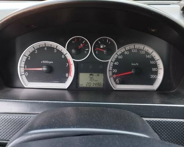 Красный Шевроле Авео, объемом двигателя 1.5 л и пробегом 201 тыс. км за 4000 $, фото 7 на Automoto.ua