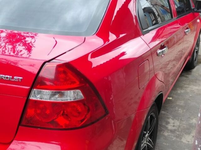 Красный Шевроле Авео, объемом двигателя 1.5 л и пробегом 200 тыс. км за 4500 $, фото 4 на Automoto.ua