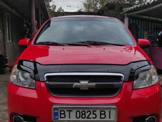 Красный Шевроле Авео, объемом двигателя 1.5 л и пробегом 200 тыс. км за 4500 $, фото 2 на Automoto.ua