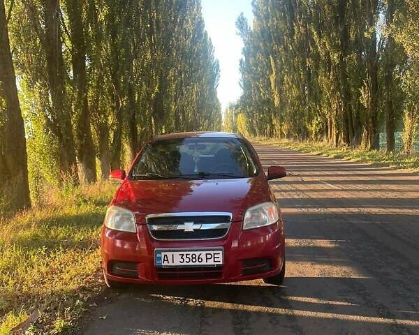 Красный Шевроле Авео, объемом двигателя 1.5 л и пробегом 210 тыс. км за 3400 $, фото 8 на Automoto.ua
