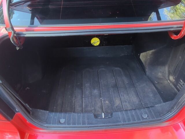 Красный Шевроле Авео, объемом двигателя 1.5 л и пробегом 241 тыс. км за 3300 $, фото 9 на Automoto.ua