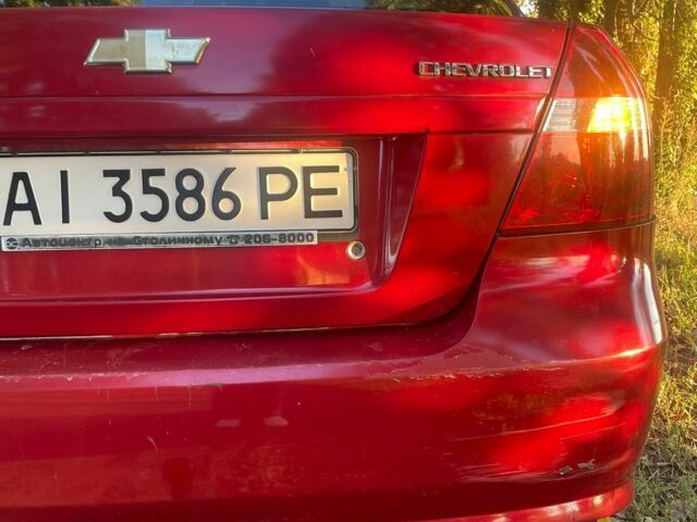 Красный Шевроле Авео, объемом двигателя 1.5 л и пробегом 210 тыс. км за 3400 $, фото 13 на Automoto.ua
