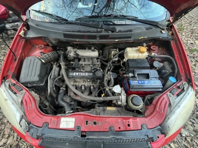 Красный Шевроле Авео, объемом двигателя 1.5 л и пробегом 184 тыс. км за 3000 $, фото 13 на Automoto.ua