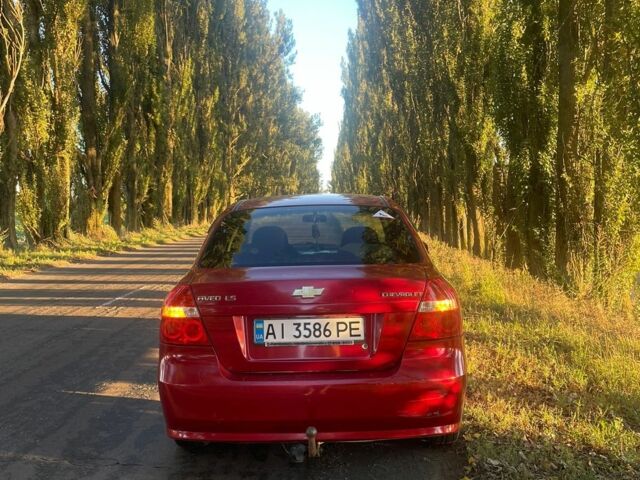 Красный Шевроле Авео, объемом двигателя 1.5 л и пробегом 210 тыс. км за 3400 $, фото 10 на Automoto.ua