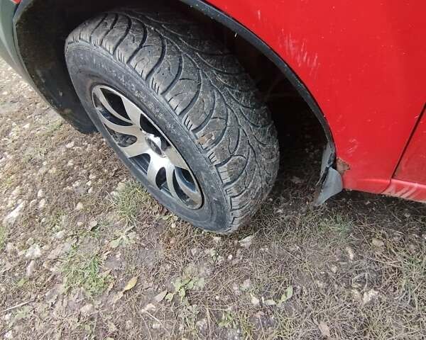 Красный Шевроле Авео, объемом двигателя 1.5 л и пробегом 163 тыс. км за 2100 $, фото 5 на Automoto.ua