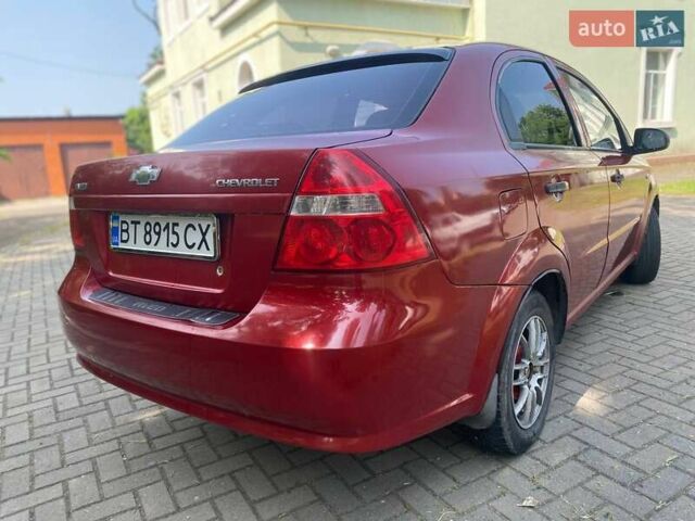 Красный Шевроле Авео, объемом двигателя 1.5 л и пробегом 260 тыс. км за 2600 $, фото 2 на Automoto.ua