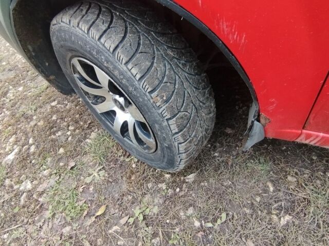 Красный Шевроле Авео, объемом двигателя 1.5 л и пробегом 163 тыс. км за 2100 $, фото 4 на Automoto.ua