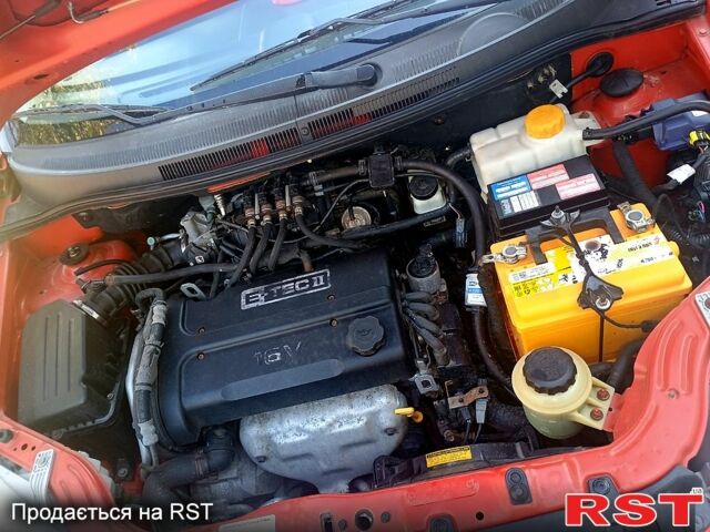 Красный Шевроле Авео, объемом двигателя 1.4 л и пробегом 126 тыс. км за 3999 $, фото 6 на Automoto.ua