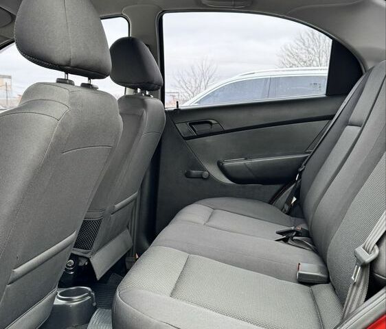 Красный Шевроле Авео, объемом двигателя 1.5 л и пробегом 27 тыс. км за 6100 $, фото 14 на Automoto.ua