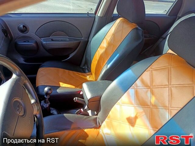 Красный Шевроле Авео, объемом двигателя 1.5 л и пробегом 190 тыс. км за 3100 $, фото 12 на Automoto.ua