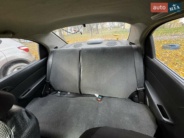 Красный Шевроле Авео, объемом двигателя 1.4 л и пробегом 168 тыс. км за 3700 $, фото 8 на Automoto.ua