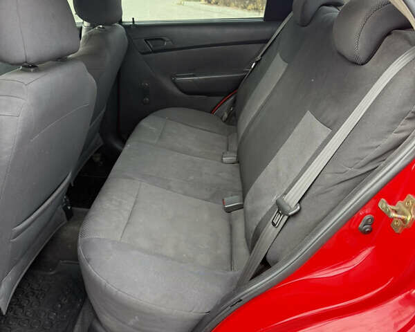 Красный Шевроле Авео, объемом двигателя 1.5 л и пробегом 187 тыс. км за 3300 $, фото 12 на Automoto.ua