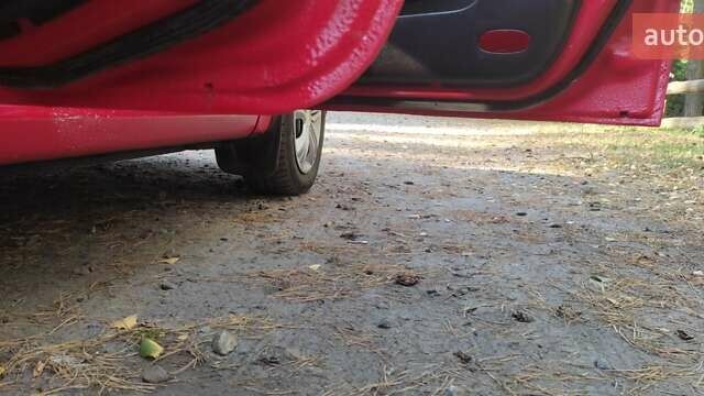 Красный Шевроле Авео, объемом двигателя 1.5 л и пробегом 241 тыс. км за 3500 $, фото 9 на Automoto.ua
