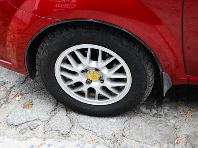 Красный Шевроле Авео, объемом двигателя 1.5 л и пробегом 87 тыс. км за 4800 $, фото 14 на Automoto.ua