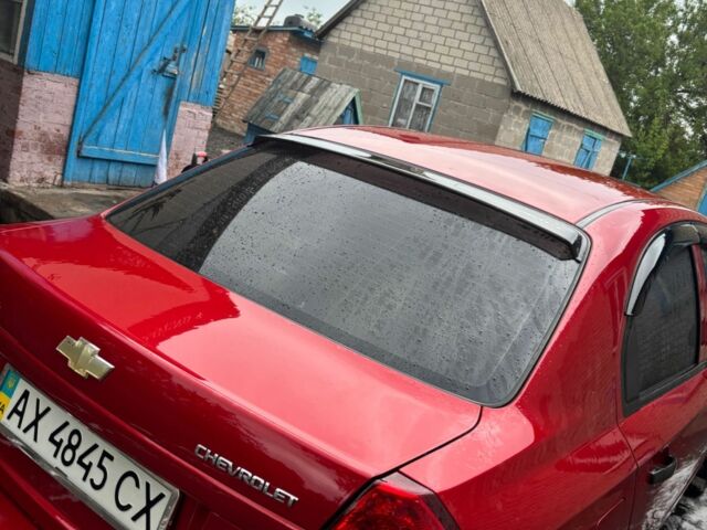 Червоний Шевроле Авео, об'ємом двигуна 1.5 л та пробігом 127 тис. км за 5400 $, фото 7 на Automoto.ua