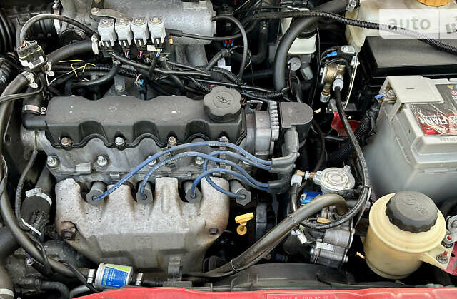 Красный Шевроле Авео, объемом двигателя 1.5 л и пробегом 167 тыс. км за 3750 $, фото 9 на Automoto.ua