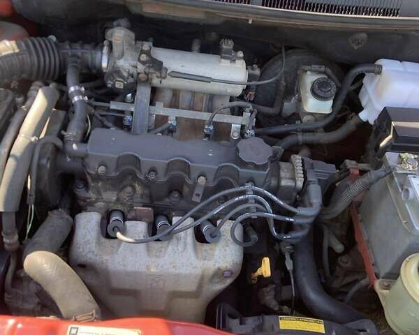 Красный Шевроле Авео, объемом двигателя 1.5 л и пробегом 160 тыс. км за 3800 $, фото 5 на Automoto.ua