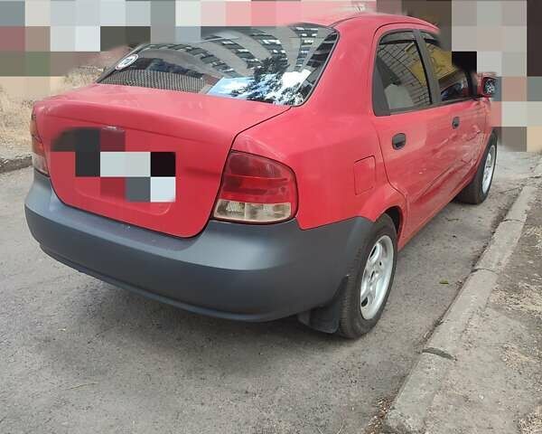 Красный Шевроле Авео, объемом двигателя 1.5 л и пробегом 295 тыс. км за 3000 $, фото 1 на Automoto.ua