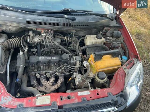 Червоний Шевроле Авео, об'ємом двигуна 1.5 л та пробігом 294 тис. км за 2800 $, фото 13 на Automoto.ua