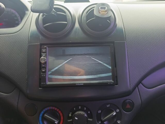 Красный Шевроле Авео, объемом двигателя 1.5 л и пробегом 162 тыс. км за 3537 $, фото 5 на Automoto.ua