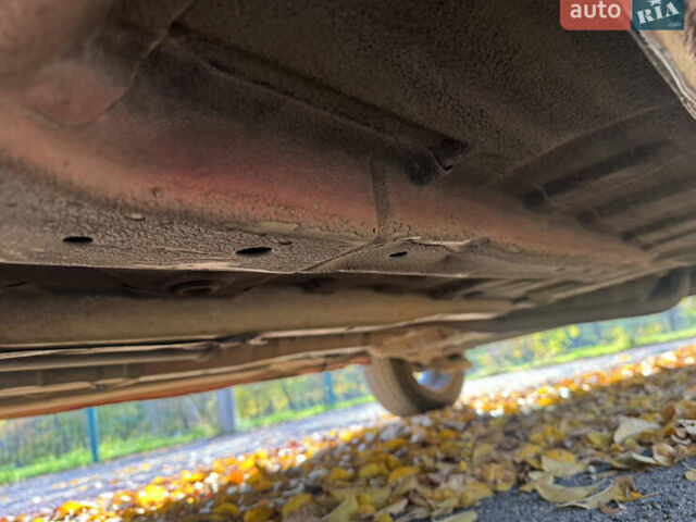 Красный Шевроле Авео, объемом двигателя 1.5 л и пробегом 230 тыс. км за 3750 $, фото 14 на Automoto.ua