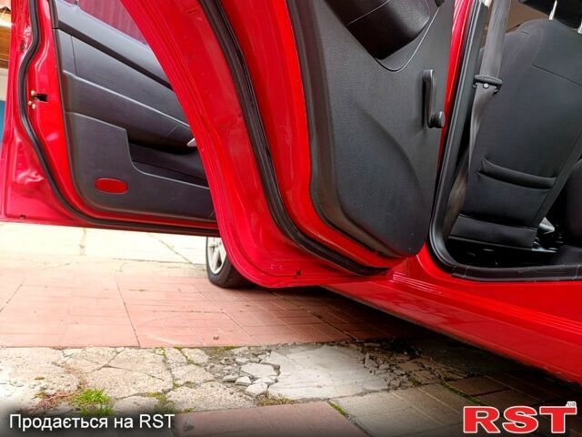 Червоний Шевроле Авео, об'ємом двигуна 1.5 л та пробігом 160 тис. км за 3800 $, фото 13 на Automoto.ua