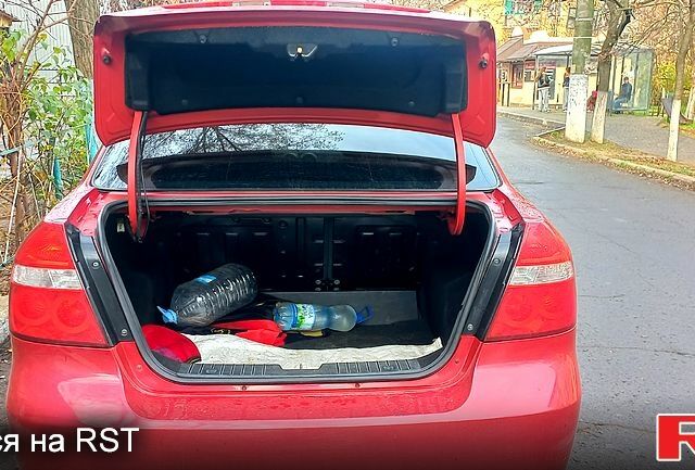 Червоний Шевроле Авео, об'ємом двигуна 1.5 л та пробігом 168 тис. км за 4200 $, фото 10 на Automoto.ua