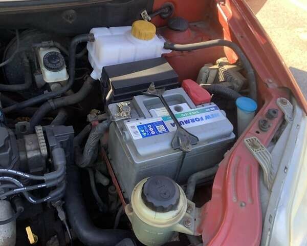 Красный Шевроле Авео, объемом двигателя 1.5 л и пробегом 160 тыс. км за 3800 $, фото 4 на Automoto.ua