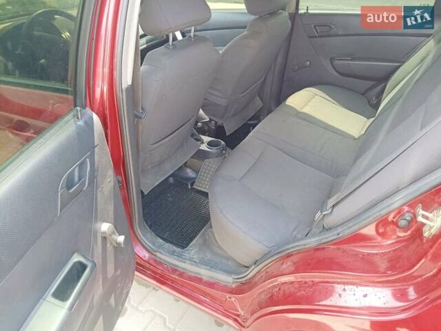 Червоний Шевроле Авео, об'ємом двигуна 1.5 л та пробігом 300 тис. км за 4000 $, фото 3 на Automoto.ua