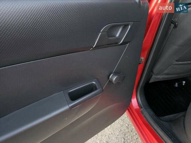 Шевроле Авео 2007 у Хмельницькому на Automoto.ua Червоний Шевроле Авео, об'ємом двигуна 1.5 л та пробігом 180 тис. км за 3299 $, фото 34 на Automoto.ua