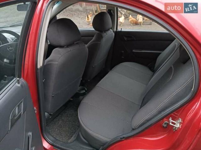 Червоний Шевроле Авео, об'ємом двигуна 1.5 л та пробігом 215 тис. км за 3800 $, фото 10 на Automoto.ua