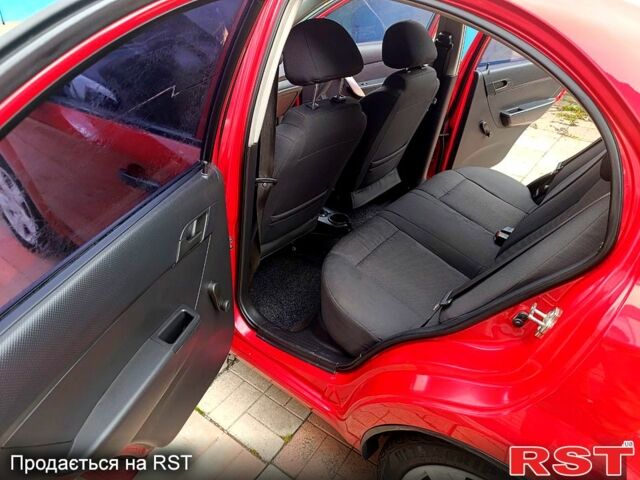 Червоний Шевроле Авео, об'ємом двигуна 1.5 л та пробігом 160 тис. км за 3800 $, фото 11 на Automoto.ua