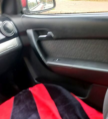 Червоний Шевроле Авео, об'ємом двигуна 1.5 л та пробігом 168 тис. км за 4200 $, фото 7 на Automoto.ua