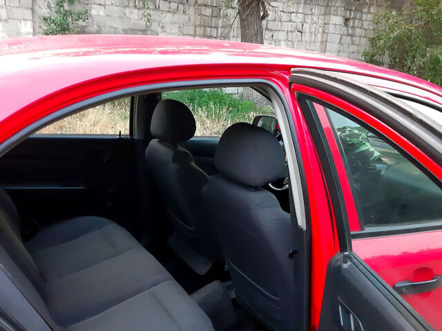 Червоний Шевроле Авео, об'ємом двигуна 1.5 л та пробігом 177 тис. км за 1950 $, фото 8 на Automoto.ua