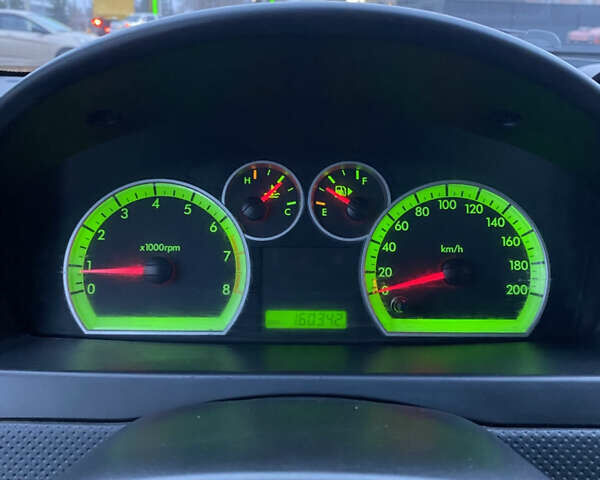 Красный Шевроле Авео, объемом двигателя 1.5 л и пробегом 160 тыс. км за 4700 $, фото 15 на Automoto.ua