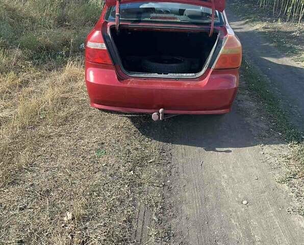 Червоний Шевроле Авео, об'ємом двигуна 1.5 л та пробігом 294 тис. км за 2800 $, фото 14 на Automoto.ua