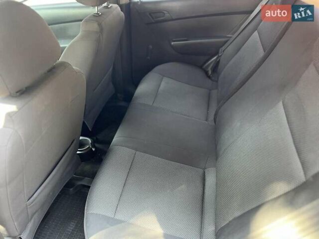 Красный Шевроле Авео, объемом двигателя 1.5 л и пробегом 168 тыс. км за 3999 $, фото 10 на Automoto.ua