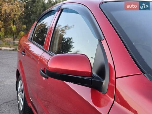 Шевроле Авео 2007 у Хмельницькому на Automoto.ua Червоний Шевроле Авео, об'ємом двигуна 1.5 л та пробігом 180 тис. км за 3299 $, фото 9 на Automoto.ua