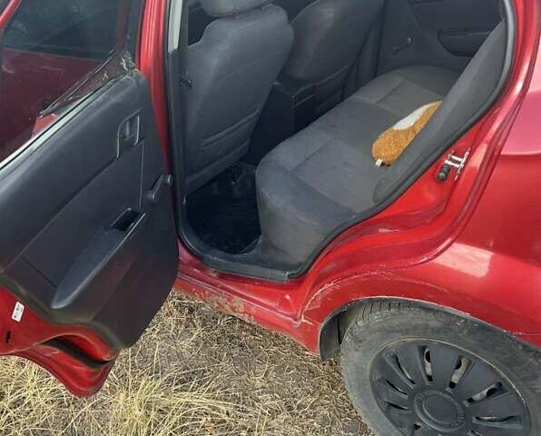 Червоний Шевроле Авео, об'ємом двигуна 1.5 л та пробігом 294 тис. км за 2800 $, фото 8 на Automoto.ua