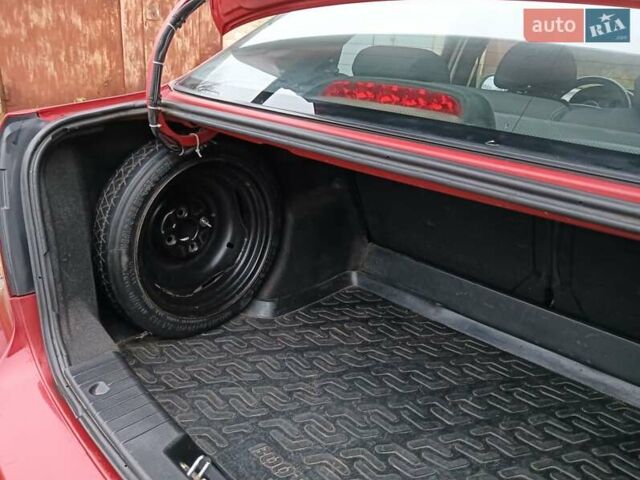 Червоний Шевроле Авео, об'ємом двигуна 1.5 л та пробігом 215 тис. км за 3800 $, фото 16 на Automoto.ua