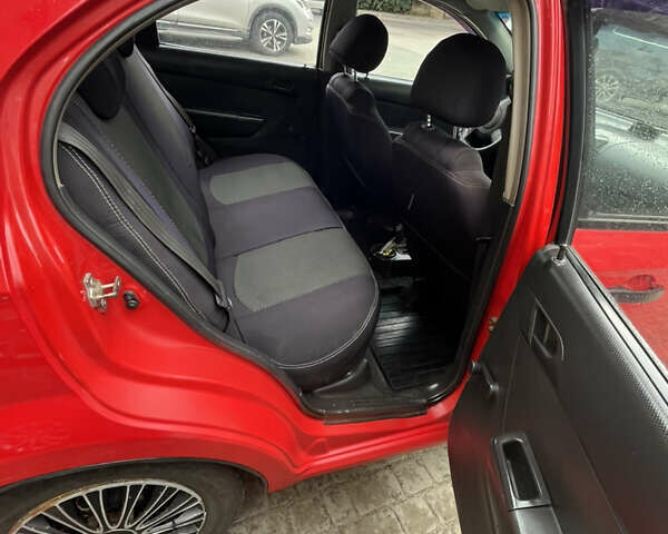 Червоний Шевроле Авео, об'ємом двигуна 1.5 л та пробігом 181 тис. км за 2700 $, фото 14 на Automoto.ua