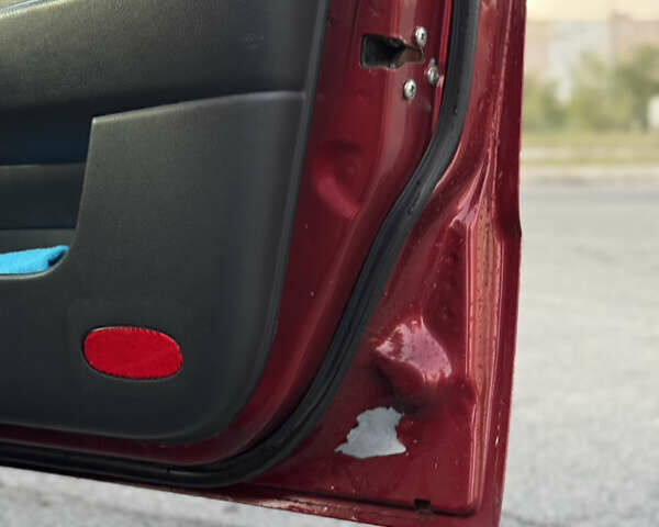 Червоний Шевроле Авео, об'ємом двигуна 1.5 л та пробігом 213 тис. км за 2600 $, фото 18 на Automoto.ua