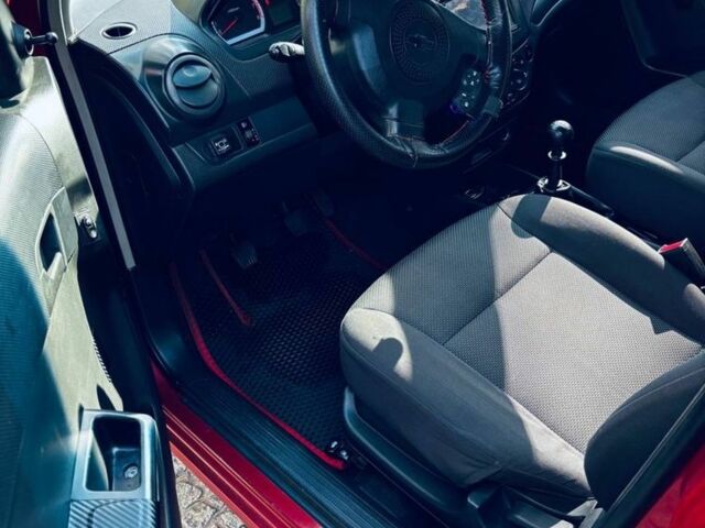 Красный Шевроле Авео, объемом двигателя 1.5 л и пробегом 185 тыс. км за 3399 $, фото 8 на Automoto.ua