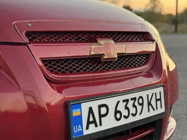 Червоний Шевроле Авео, об'ємом двигуна 1.5 л та пробігом 213 тис. км за 2200 $, фото 11 на Automoto.ua