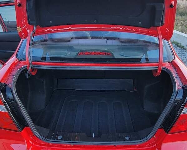 Красный Шевроле Авео, объемом двигателя 1.5 л и пробегом 151 тыс. км за 4900 $, фото 20 на Automoto.ua