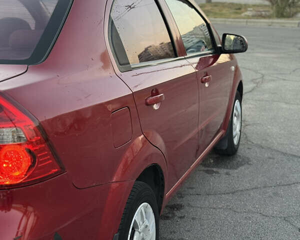 Червоний Шевроле Авео, об'ємом двигуна 1.5 л та пробігом 213 тис. км за 2600 $, фото 14 на Automoto.ua