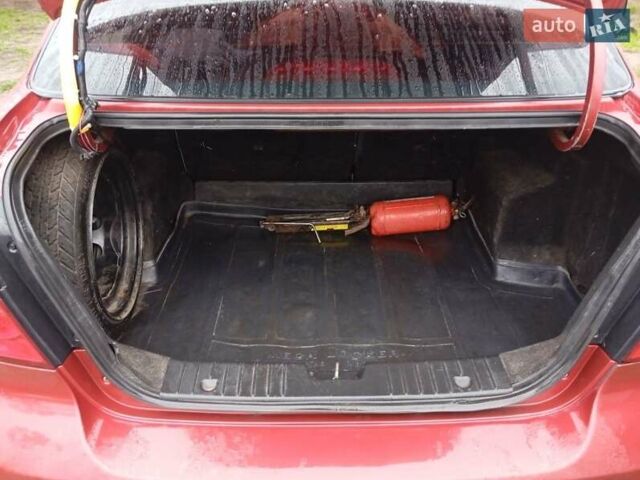 Красный Шевроле Авео, объемом двигателя 1.5 л и пробегом 234 тыс. км за 3200 $, фото 6 на Automoto.ua