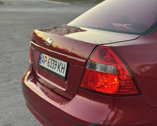 Червоний Шевроле Авео, об'ємом двигуна 1.5 л та пробігом 213 тис. км за 2600 $, фото 15 на Automoto.ua
