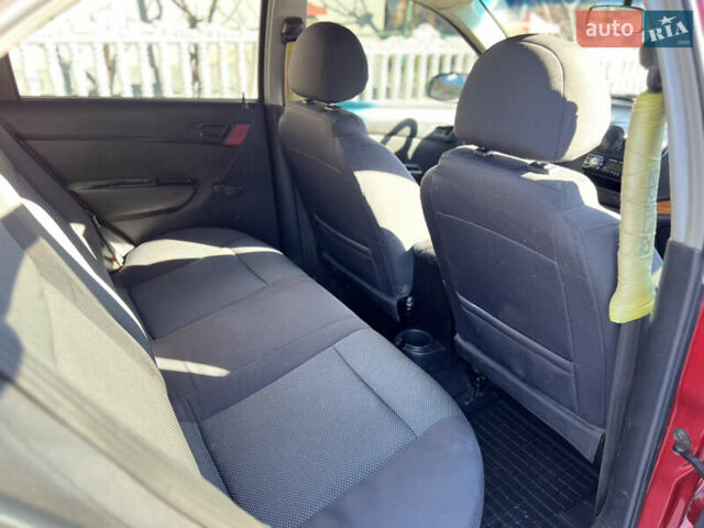 Червоний Шевроле Авео, об'ємом двигуна 1.5 л та пробігом 178 тис. км за 2999 $, фото 29 на Automoto.ua